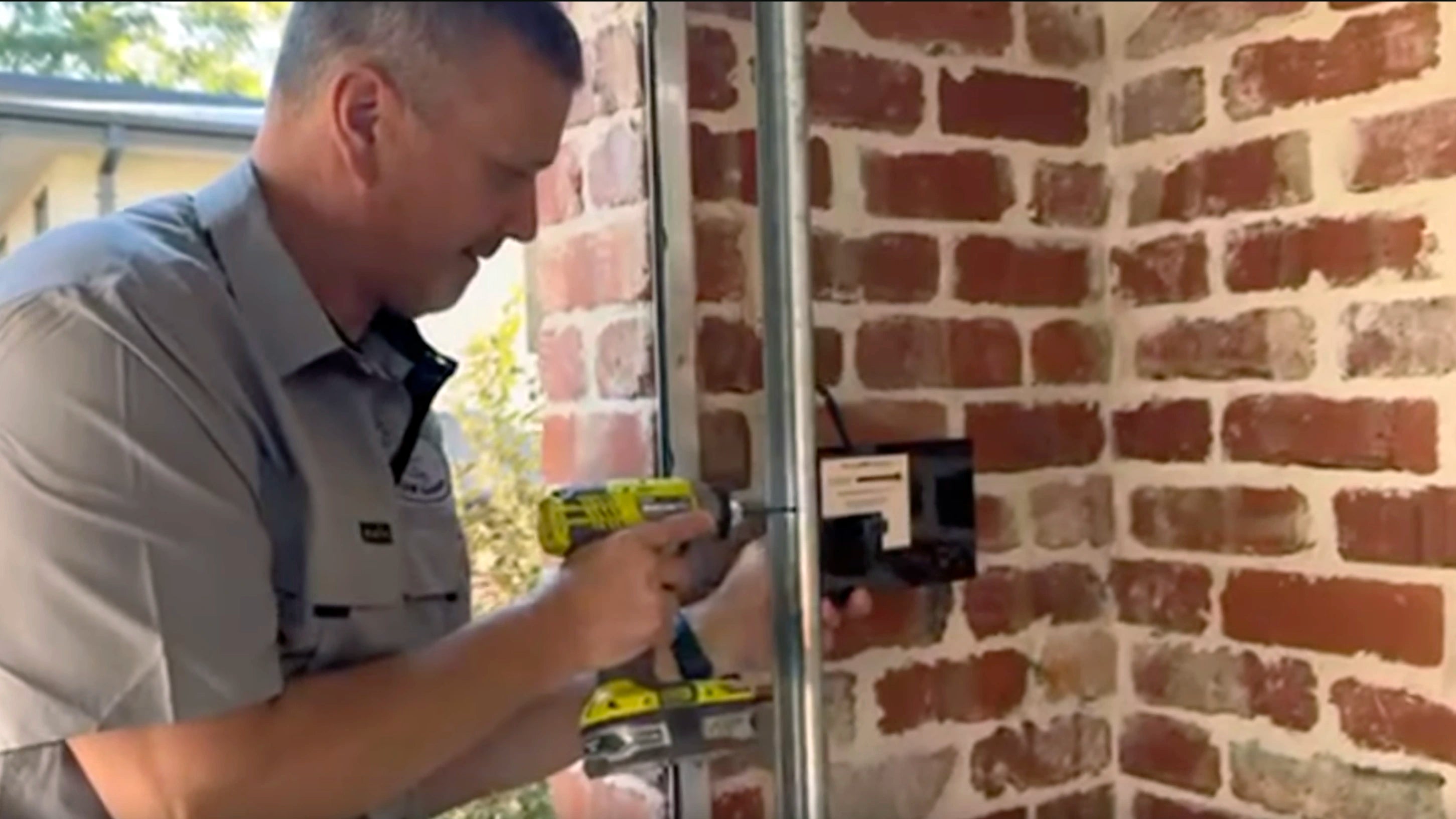 Andre from Strong ARM Solutions installing the Garage deadbolt