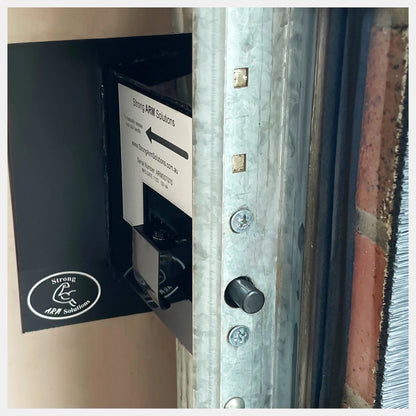 Strong Arm Solutions Deadbolt installed to Garage Door